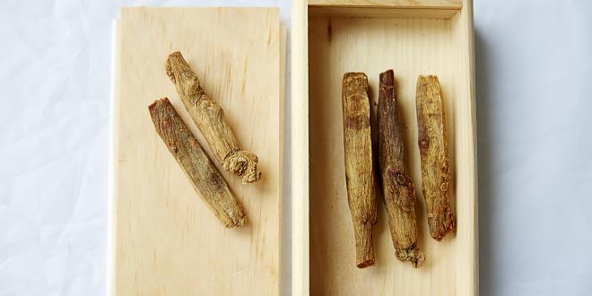 a wooden box of Korean red ginseng root